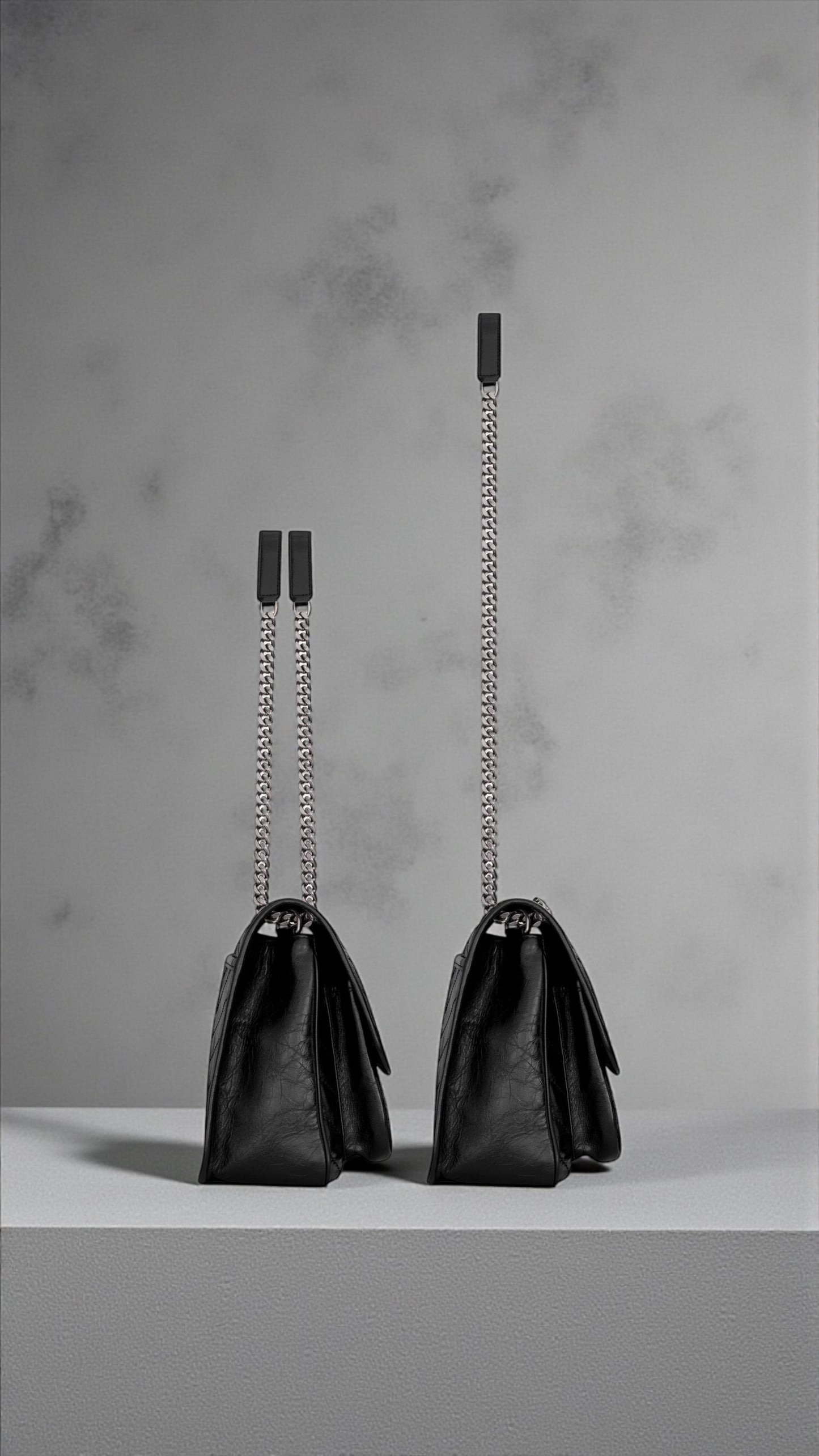 Saint Laurent Niki Medium nera con logo nero e catena argento