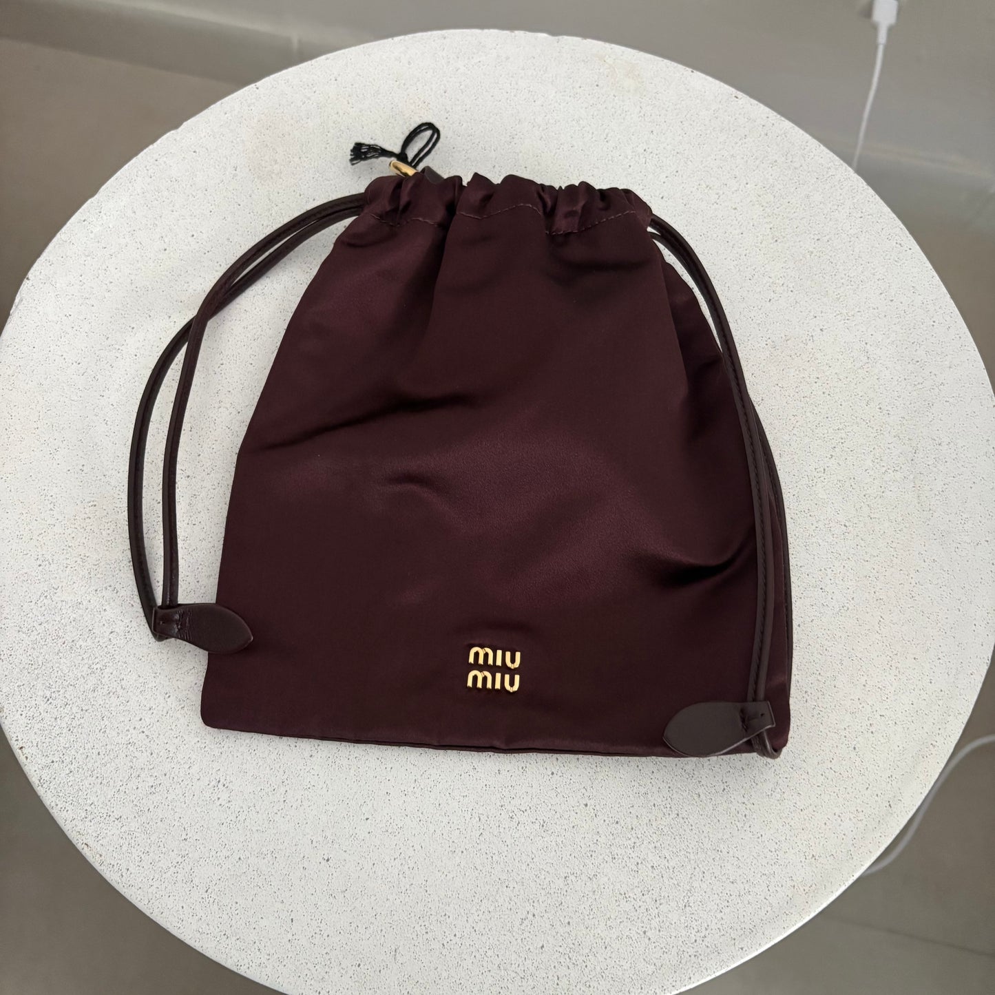 Miu Miu Pochette bordeaux in tessuto