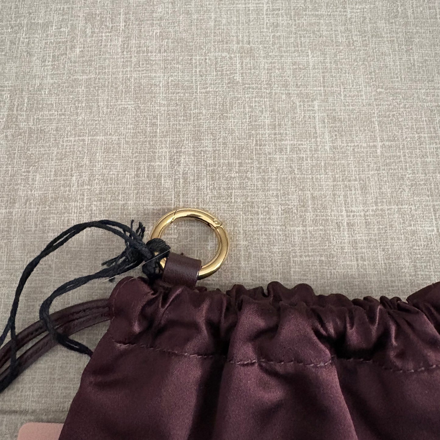 Miu Miu Pochette bordeaux in tessuto