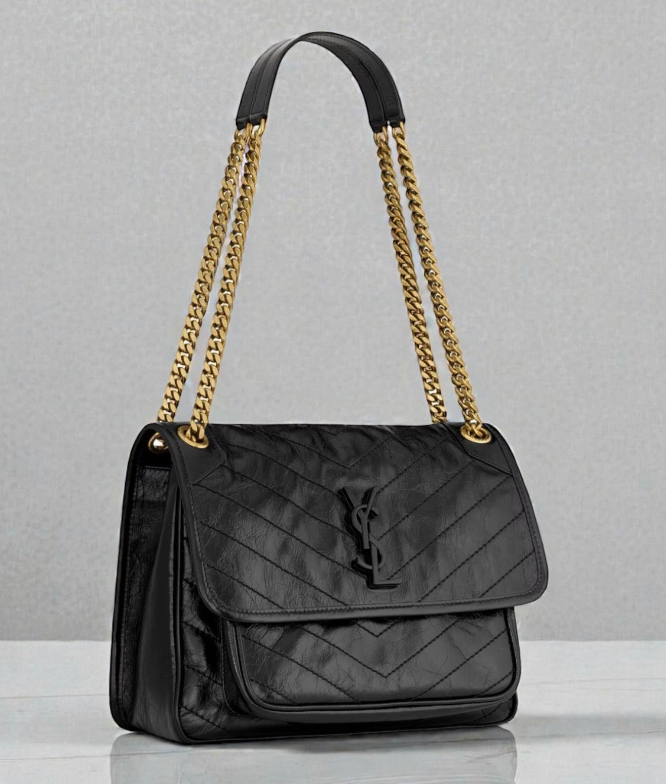 Saint Laurent Niki Medium nera con logo nero