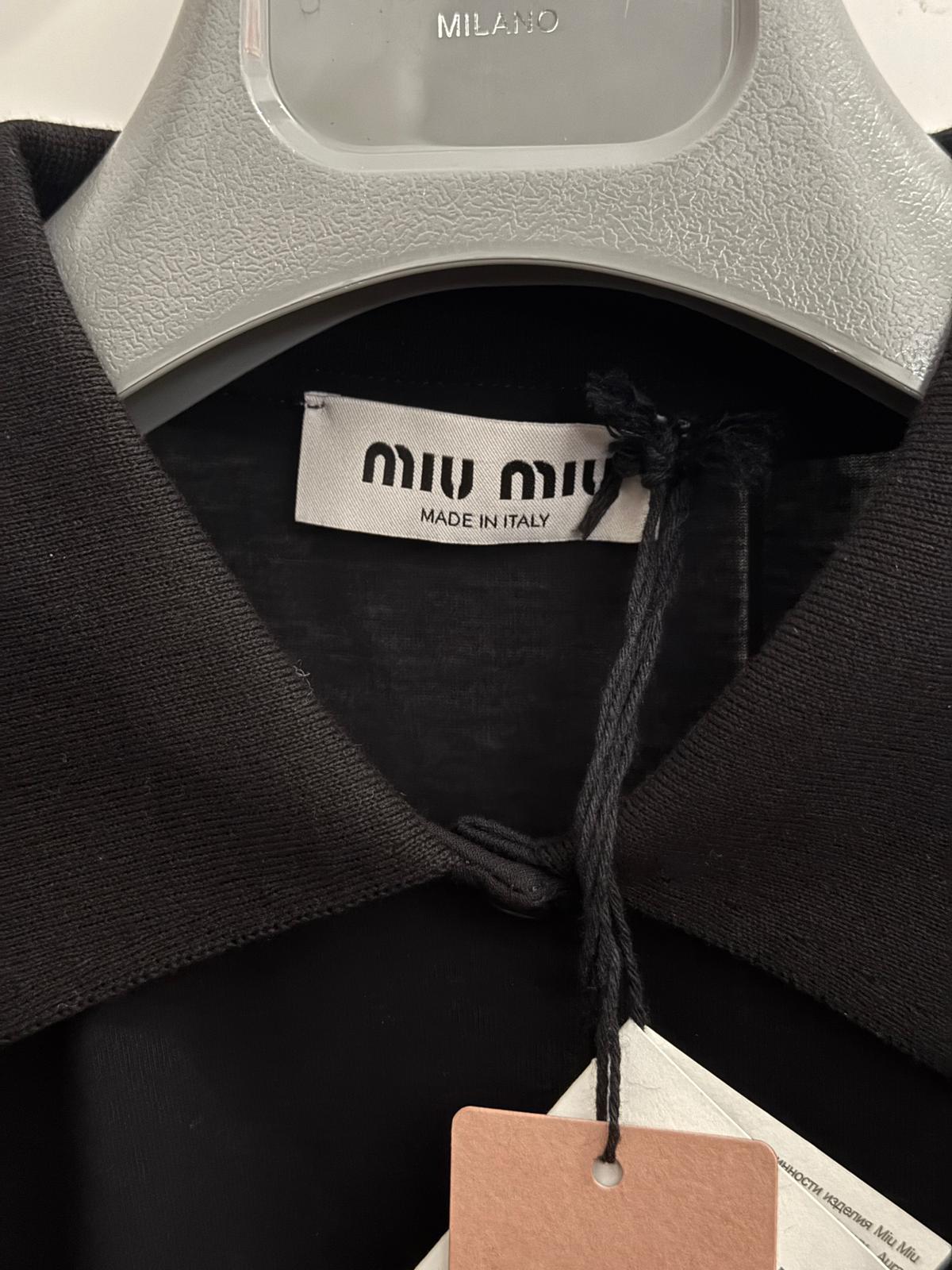 Miu Miu Polo nera trasparente