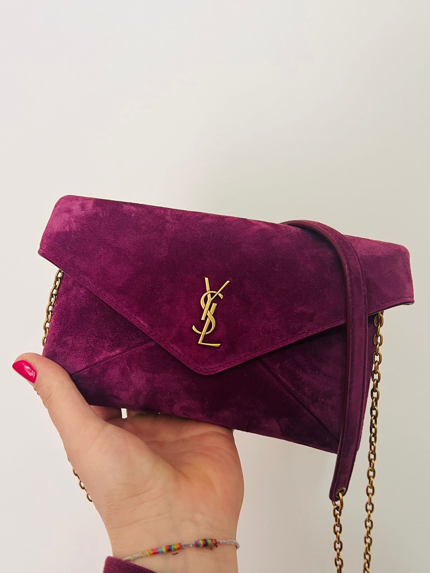 Saint Laurent Pochette piccola Cassandra in suede Deep Fucsia