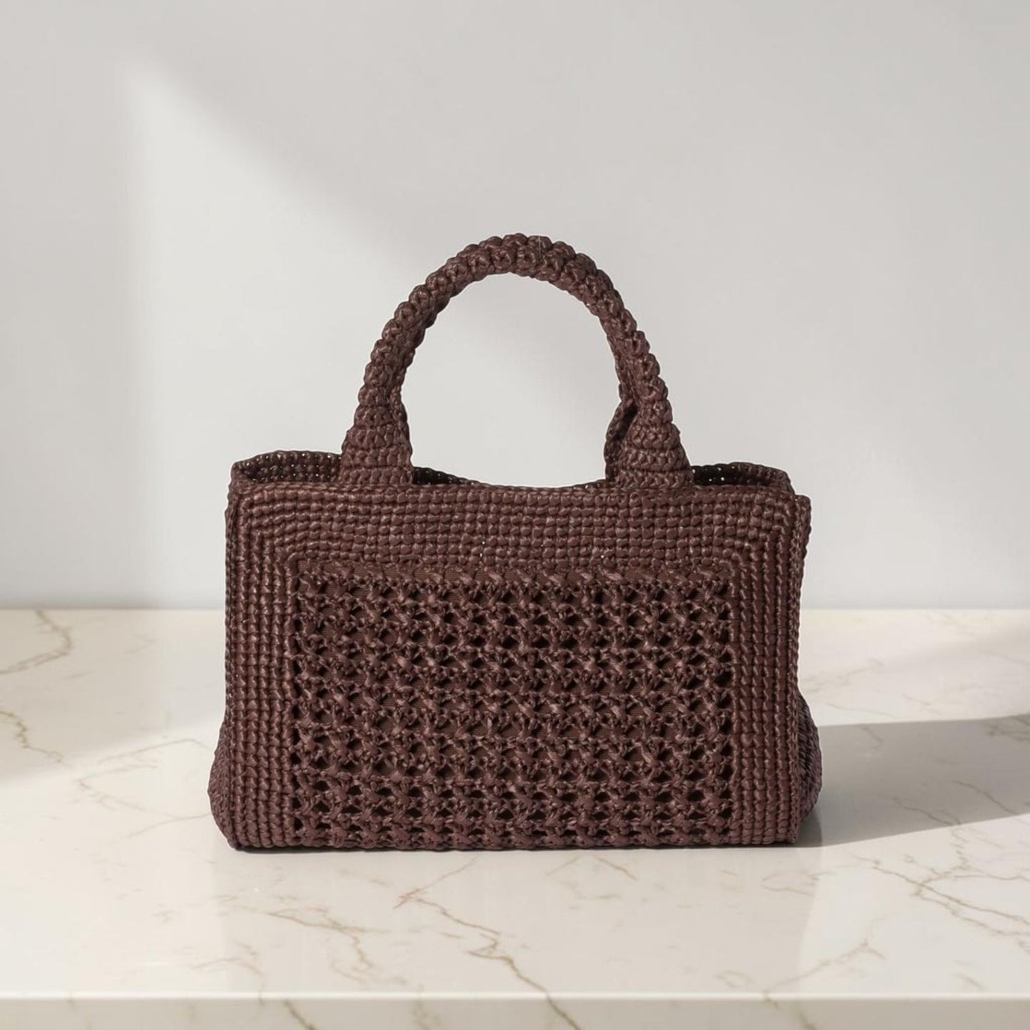 Miu Miu Borsa a mano effetto rafia intrecciata