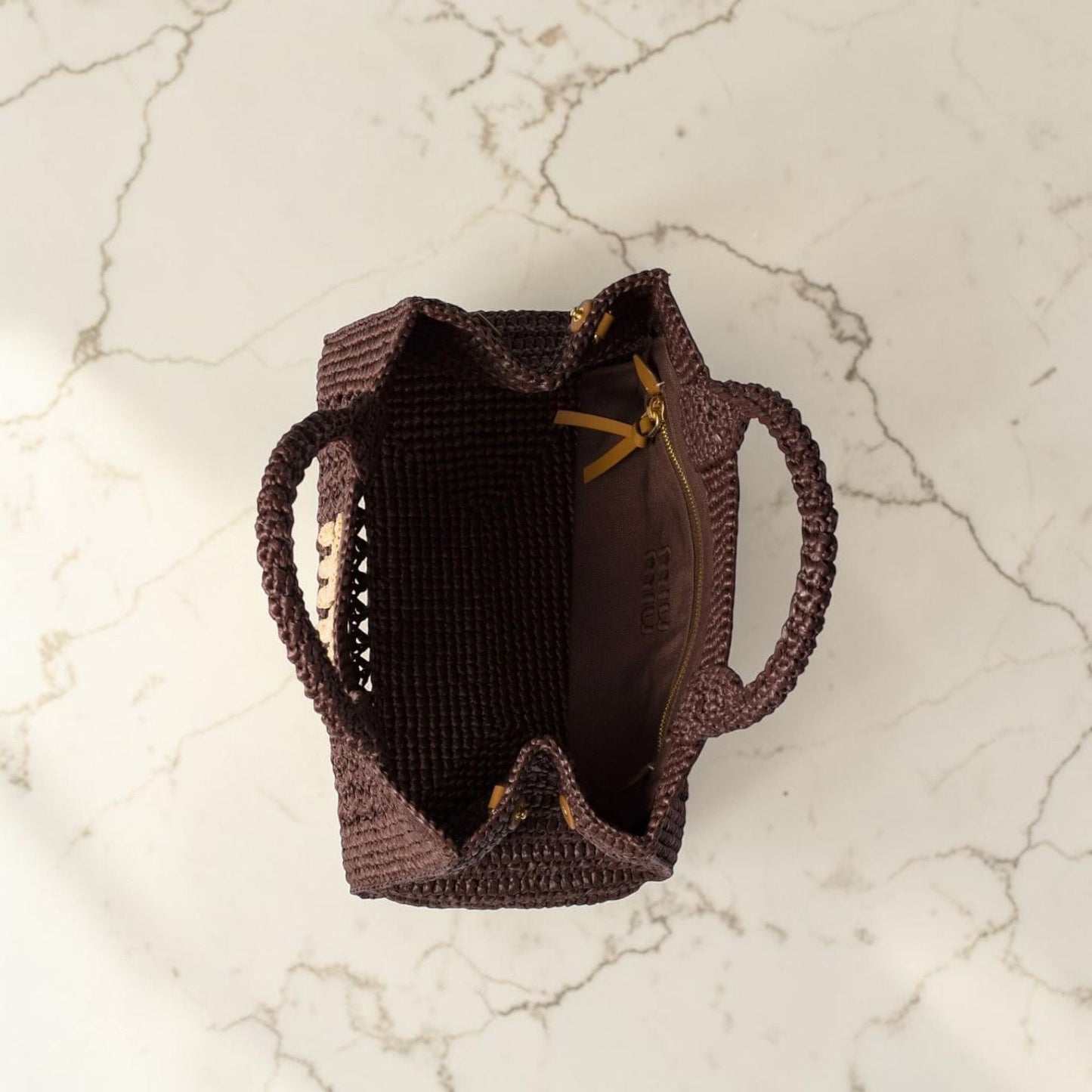 Miu Miu Borsa a mano effetto rafia intrecciata