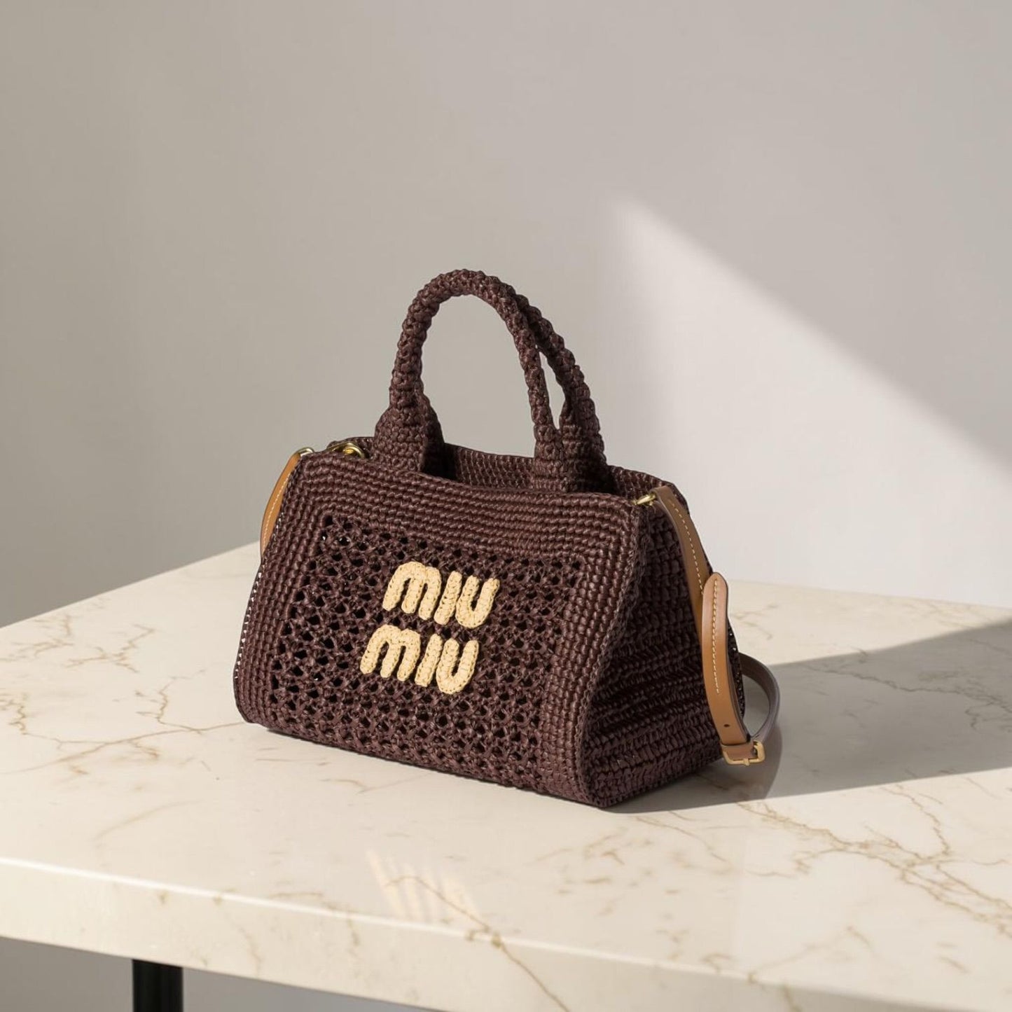 Miu Miu Borsa a mano effetto rafia intrecciata
