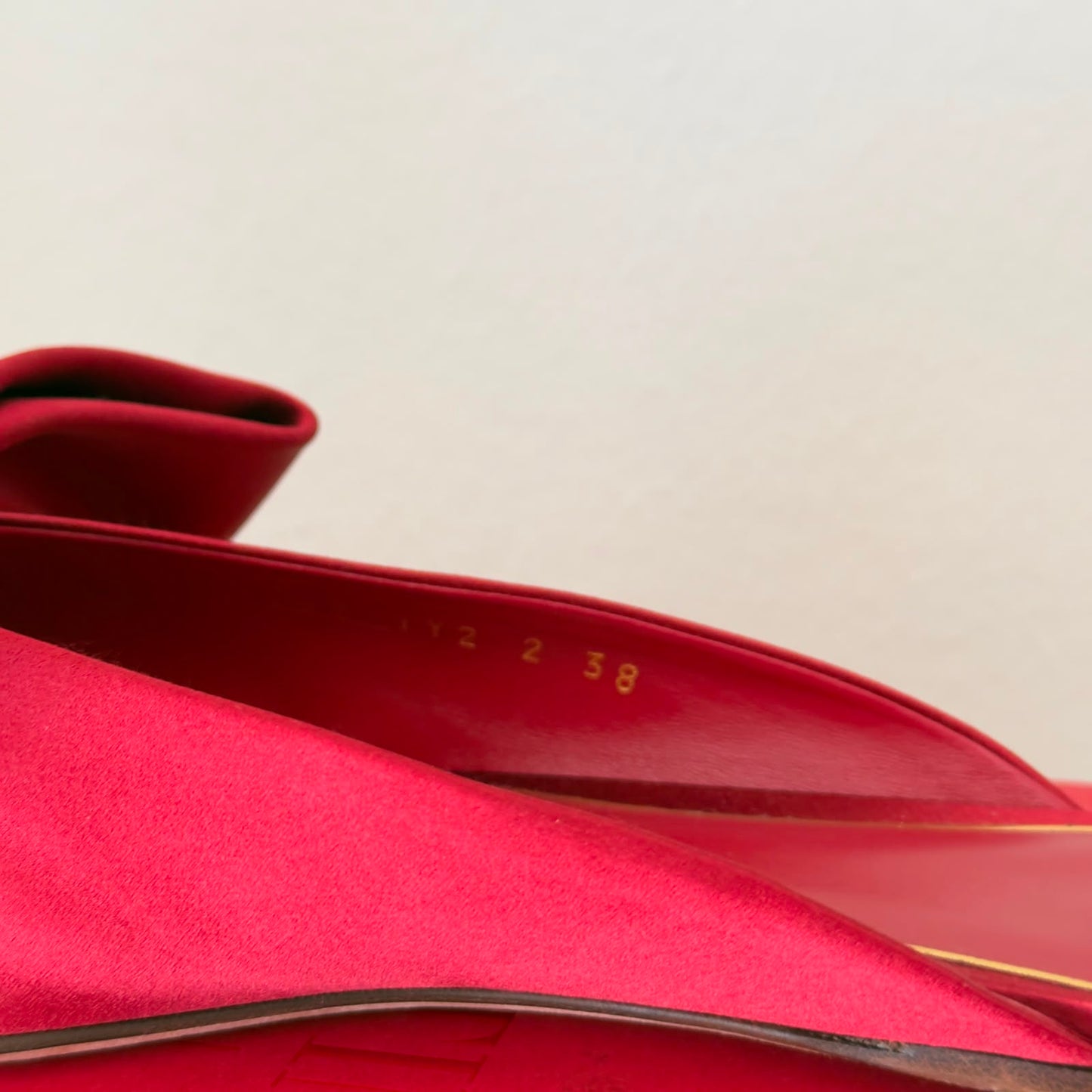Valentino Mules flat con fiocco in rosso