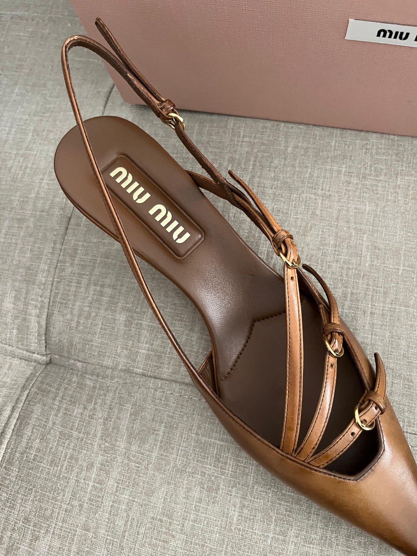 Sand patent slingback pumps