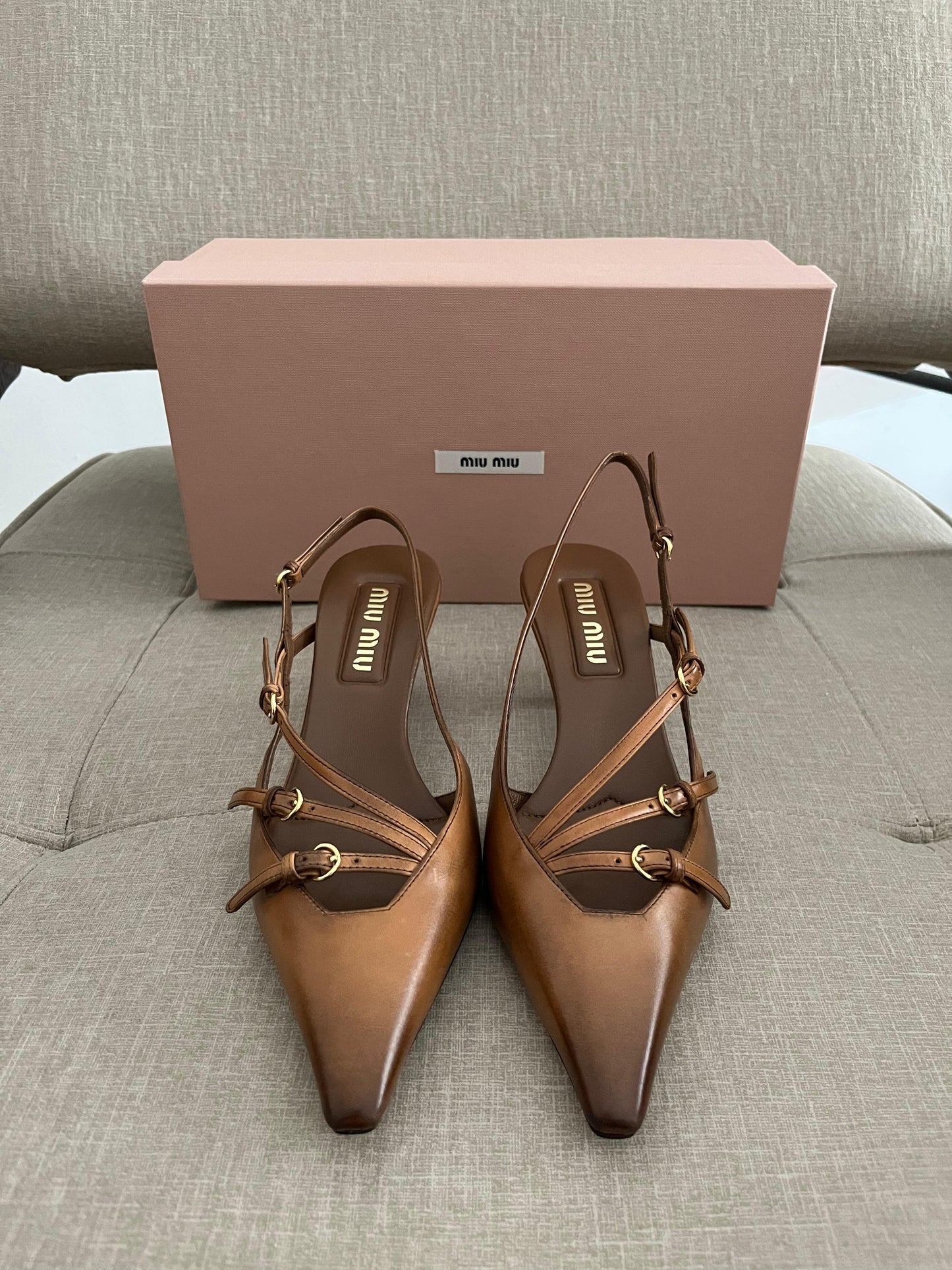Sand patent slingback pumps