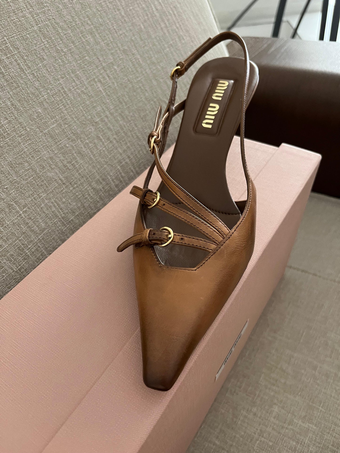 Sand patent slingback pumps