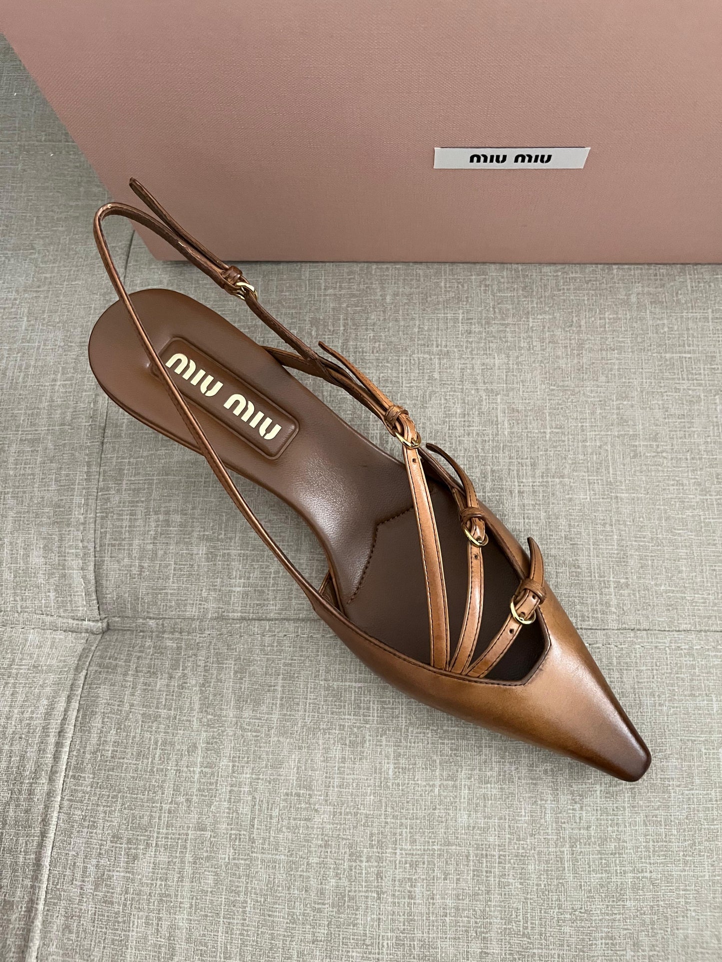 Sand patent slingback pumps