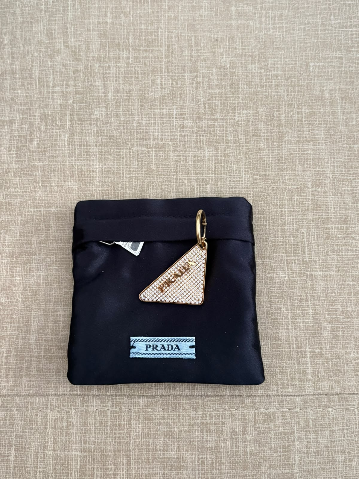 Prada orecchino oro e cristalli