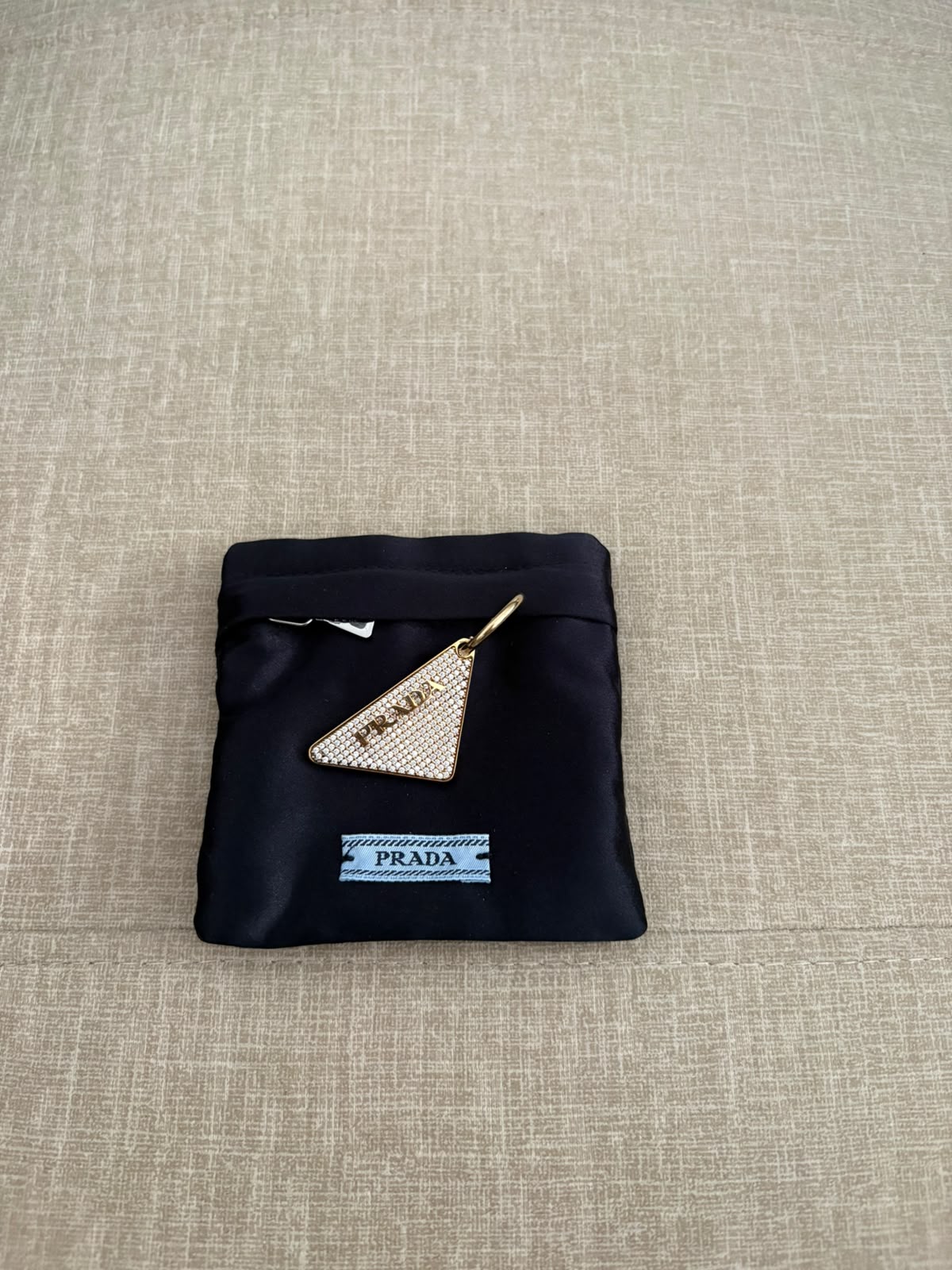Prada orecchino oro e cristalli