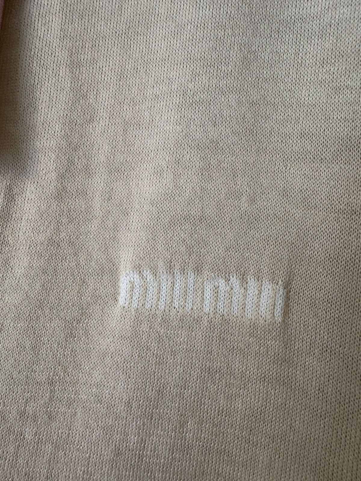 Miu Miu polo in maglia color avorio
