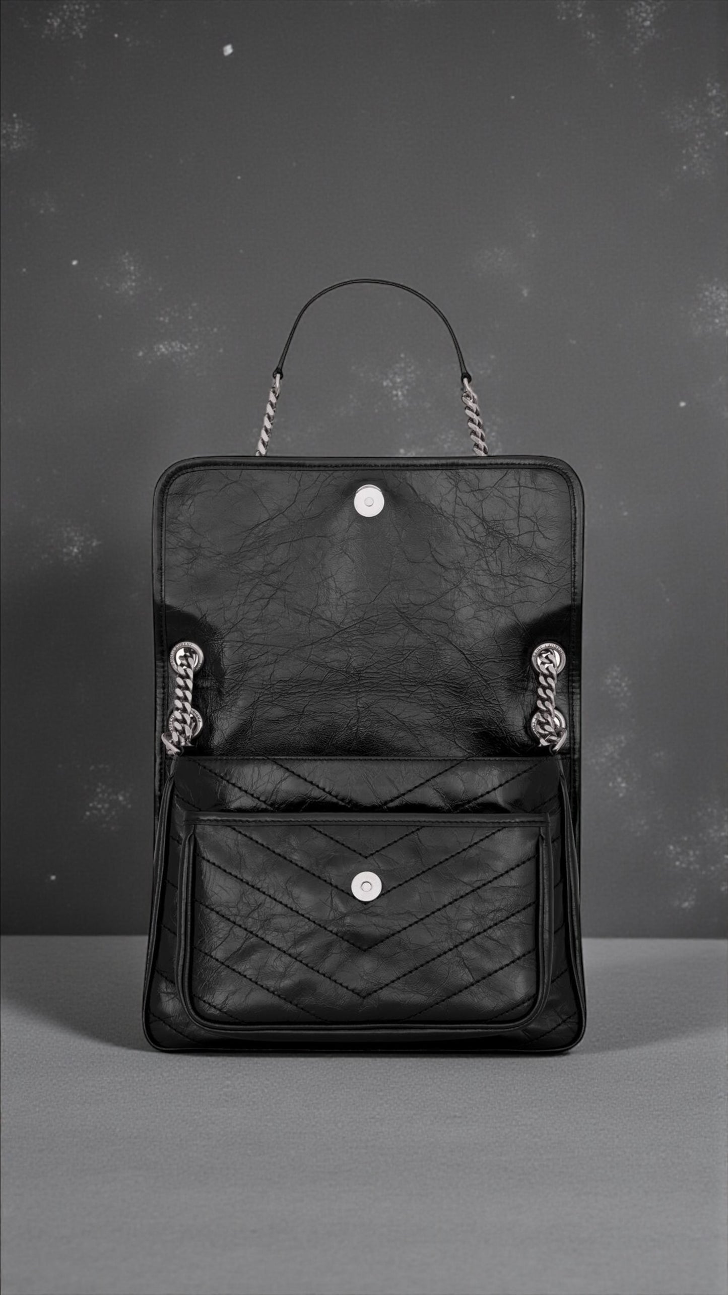 Saint Laurent Niki Medium nera con logo nero e catena argento